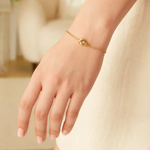 14k Yellow Gold Chain Bracelet with Polished Knot (7.50 mm) RCJ