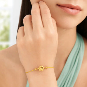 14k Yellow Gold Adjustable Paw Print Bracelet (1.10 mm) RCJ
